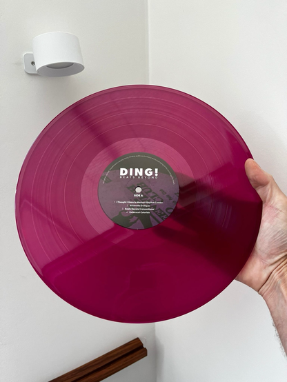 Beet colored vinyl record with Ding! printed on the label