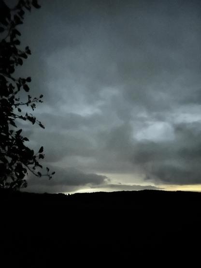 Again, it’s much later in the pic than it is to my eyes. Everything’s dark. Except for a small light over by Alliston and a barn light on the next line. It’s raining. It was thundering a minute ago.