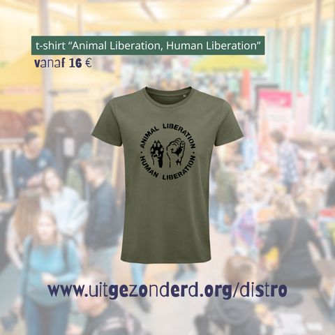 een t-shirt met animal liberation-human liberation in een rond logo waarin een vuist en een hondepoot staan.