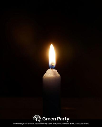 A lit cadle against darkness.  Green Party
Promoted by Chris Williams on behalf of The Green Party, both at PO Box 78066, London SE16 9GQ