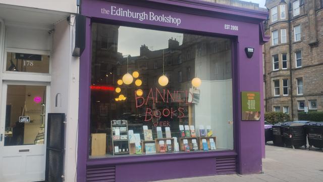 A view of the large, front window of the Edinburgh Bookshop, with the Banned Books Week display