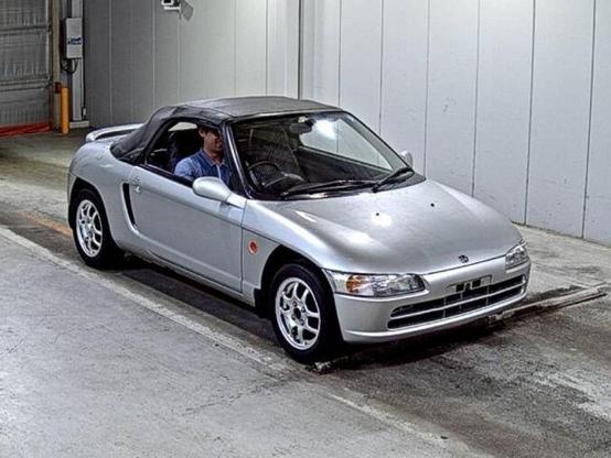 A silver honda beat