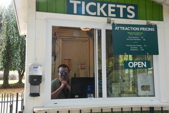 Description Provided by @marylandzoo: 
Guest services staff behind ticketing window