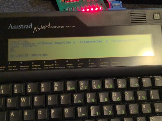 An Amstrad NC100 connected via serial port to Telnet