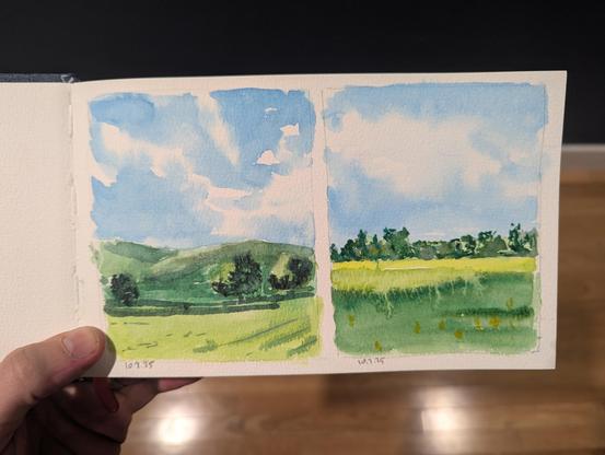 Two small watercolor landscapes. Both are brightly lit with fields receding into tree-lined background.