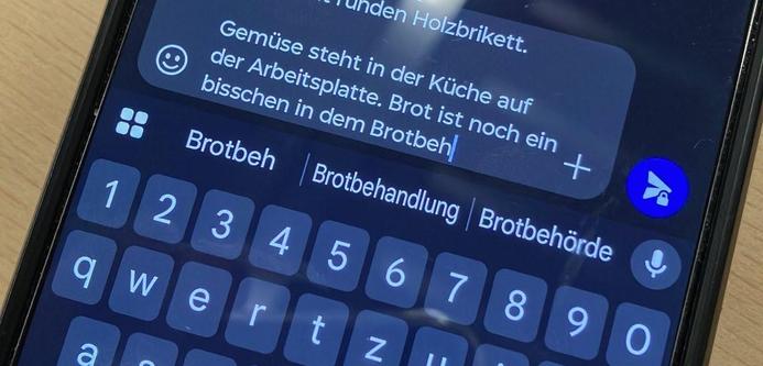 Screenshot einer App in der eine Textnachricht verfasst wird. Zur Autovervollständigung wird unter anderem das Wort "Brotbehörde" vorgeschlagen.