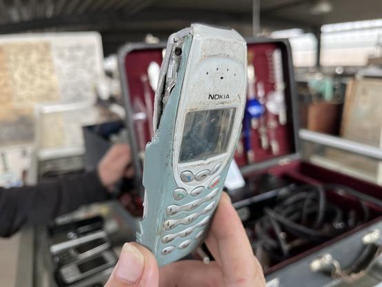 The front side of a very mangled Nokia 3410.