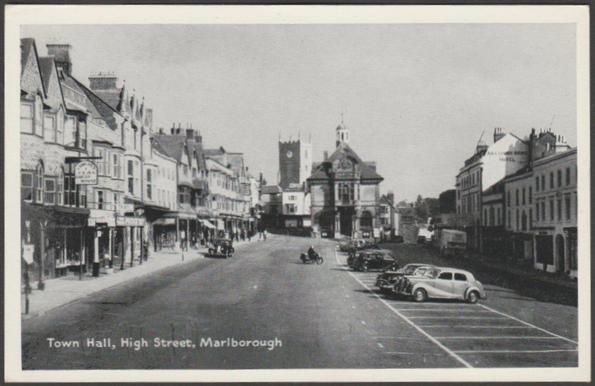 Printed monochrome postcard showing a view of the Town Hall and High Street of Marlborough in Wiltshire.

Published by T.V.A.P., Oxford Series CXXXVII, No 1837, c.1950s.

Postally unused.

Good condition, with very slight to slight corner bumps.