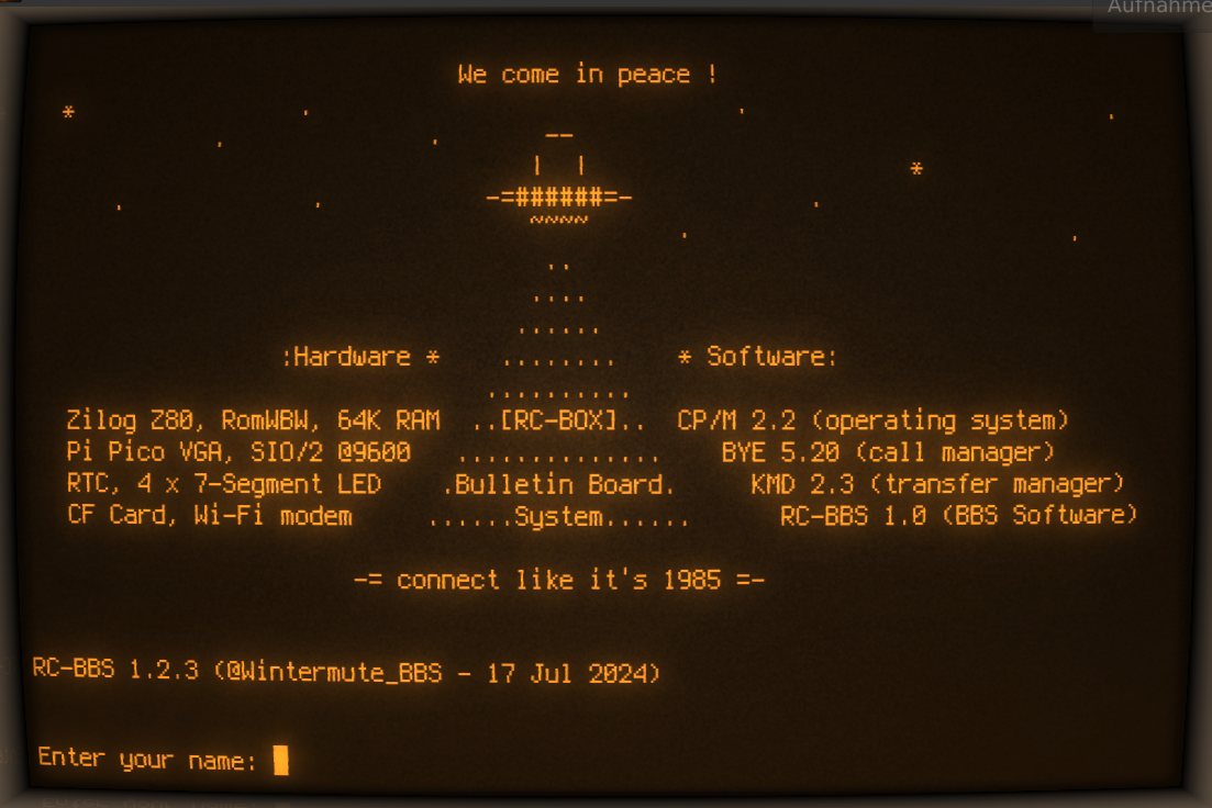 An amber terminal screen showing the ASCII art welcome banner of RC-BOX BBS and its iconic motto "connect like its 1985" Telnet: rc2014.ddns.net:2014
