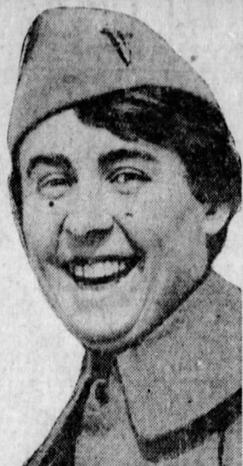 Georgiana Dvorak-Theobald, from a 1920 newspaper; a smiling white woman with dark hair, wearing a uniform