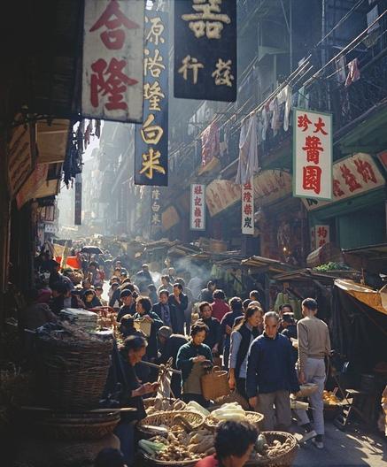 hanging signs and clotheslines, bustling streets and baskets