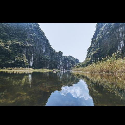 discovering the  Land Halong Bay , beautiful water reflection