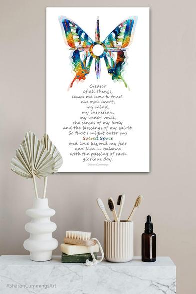 Colorful butterfly with healing poetry by artist Sharon Cummings in a decor setting.