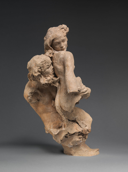 A sculpture by Auguste Rodin. A partially modeled figure of a man lifting a woman. The woman looks downward over her shoulder, her body twisting as she is supported by the man.