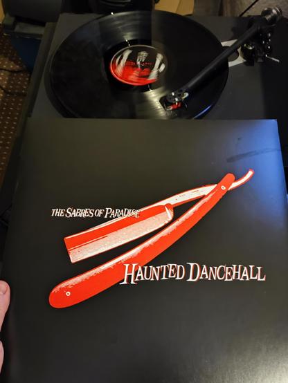 Red razerblade logo and title on black cover