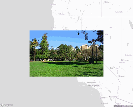 A photo of or from a park from the linked website, overlaid on a cropped world map where it's located.