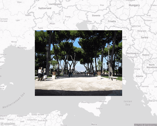A photo of or from a park from the linked website, overlaid on a cropped world map where it's located.