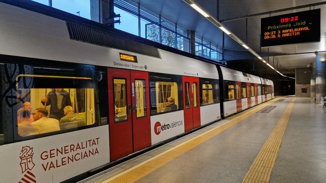 red and white metro train