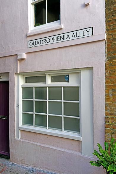 Photo of a street sign naming a narrow passageway connecting Little East Street and East Street. City of Brighton & Hove, UK.