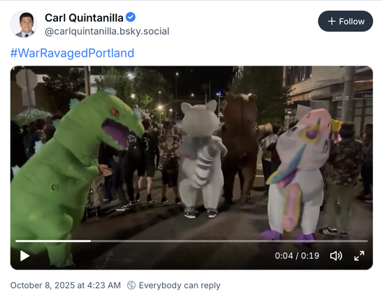 Screencap of video posted by Carl Quintanilla showing people in fursuits and air-filled animal costumes dancing on the street near the ICE facility.