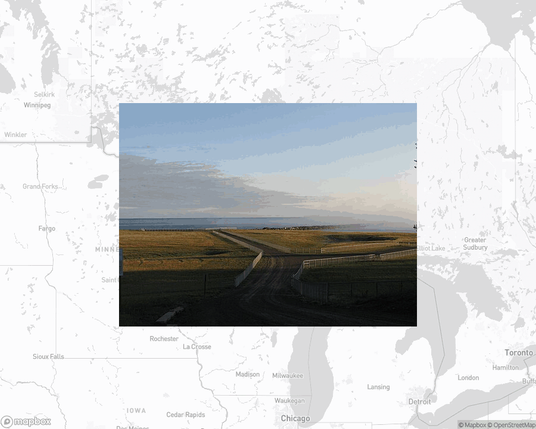 A photo of or from a park from the linked website, overlaid on a cropped world map where it's located.