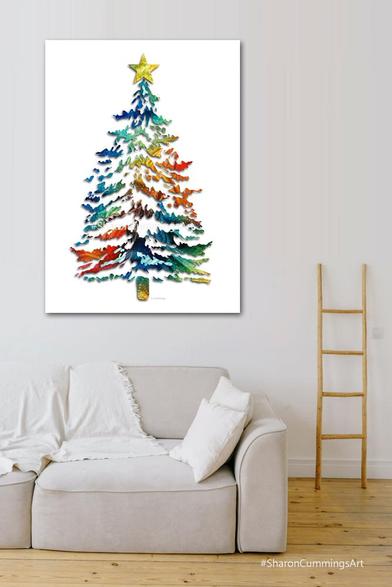 Colorful Christmas tree on white in furniture setting.