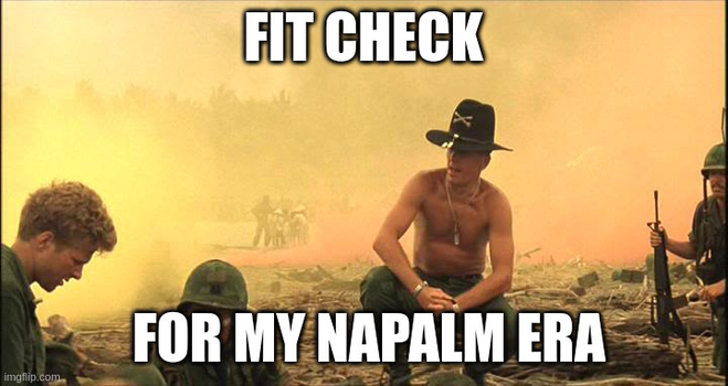 A screencap from Apocalypse Now, showing Robert Duvall as shirtless Lt. Col. Kilgore kneeling on a beach in front of recently-napalmed trees. The text over the image is the KPop Demon Hunters lyric "Fit check for my napalm era".