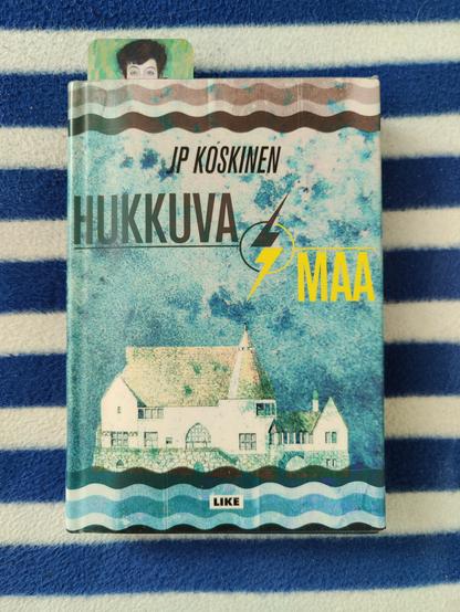 Kuvassa kirjan kansi
JP Koskinen: Hukkuva maa