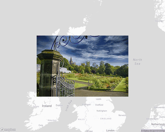 A photo of or from a park from the linked website, overlaid on a cropped world map where it's located.