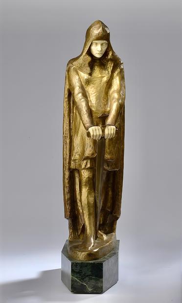 From Art UK: “Joan of Arc was a significant figure in fifteenth-century French history for claiming divine visions guiding her to save France and the reign of Charles VII at Reims during the Hundred Years’ War. The artist portrays Joan of Arc in chryselephantine – a technique blending gold and ivory – highly esteemed in ancient Greece and often used to represent deities and significant religious figures. This choice not only aligns with Jeanne d’Arc’s symbolism but also elevates her to a divine status, emphasising the significance of the medium over Lepage’s usual preference for bronze. Thus, the sculpture embodies themes of courage, and faith, symbolising bravery, devotion, and nationalism. The depiction of Jeanne wielding a sword accentuates her revered status, akin to a deity.“