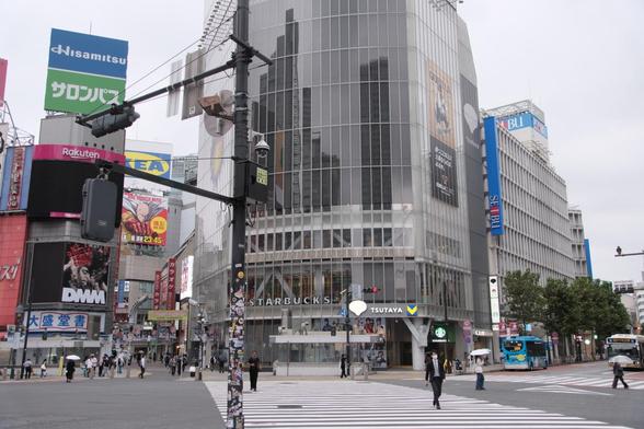 A usually insanely crowded scramble crossing in Shibuya, Tokyo, was very quiet in the early morning.