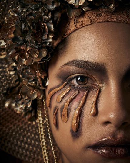 Photograph of a woman in faux pagan regalia