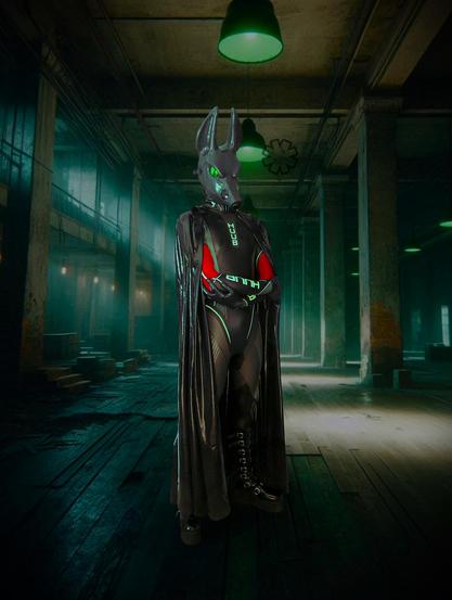 Whilst exploring an abandoned building, you come across a rubbery neoprene Jackal, his cape billowing around him in the wind that howls through smashed windows. The dim green lighting appears dimmer than the whiter light coming through the windows from the moon. His eyes glows as he looks over to you.