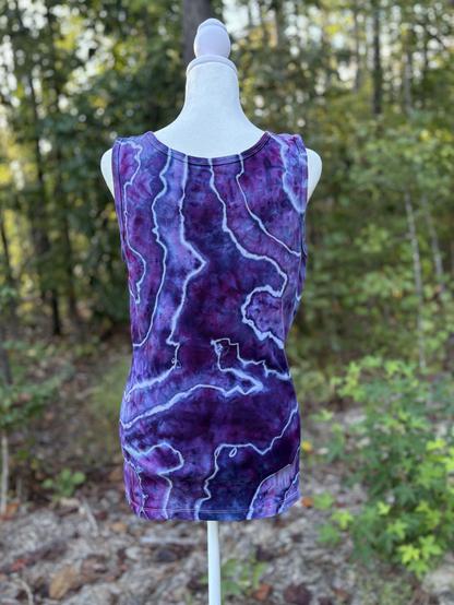 The back of an ice dyed tank top in shades of purple