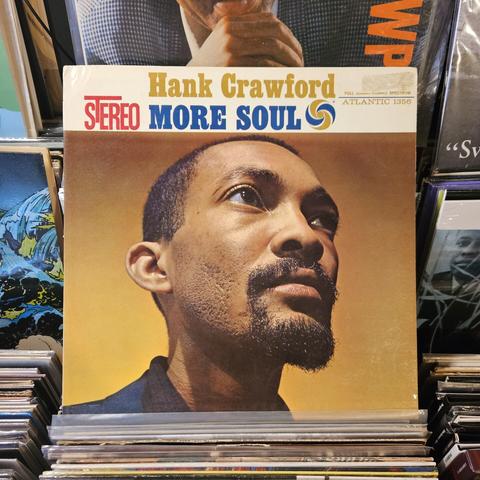 Album cover features a color photograph of HC looking upward, with a golden background.