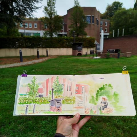 Doppelseite im Skizzenbuch mit halbfertiger Skizze vor der Katholischen Akademie.