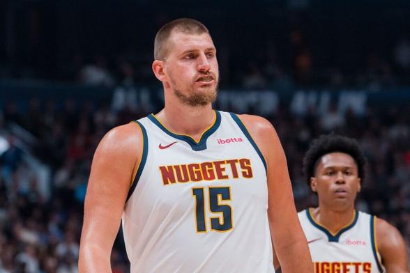 Nuggets superstar Nikola Jokic looks on against the Raptors during the 2025-26 NBA preseason.