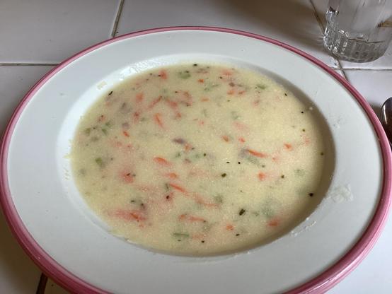 Speckled soup in bowl.