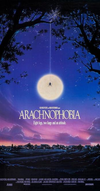 The poster from Arachnophobia (1990) shows a spider descending on a web from overhead trees in front of a full moon; below that is the movie’s title and tagline: “Eight legs, two fangs and an attitude.”
