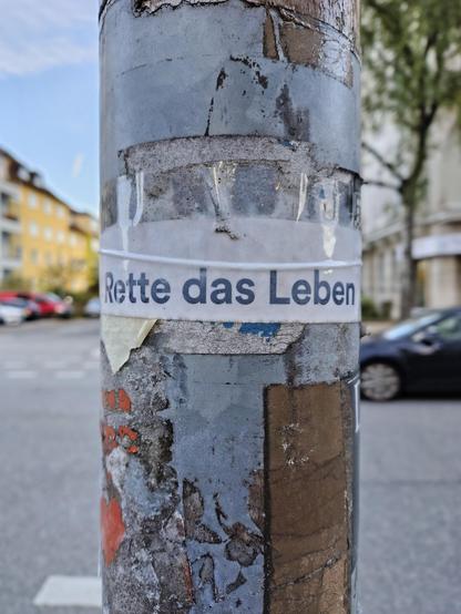 A sticker with "Save the life"