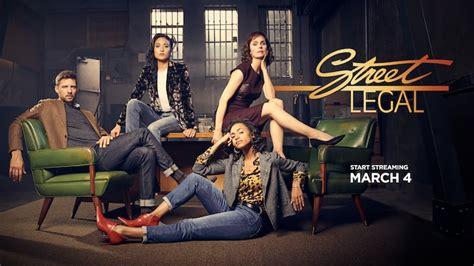 Promotional image of the cast of the show and the logo. The cast are seated and reclining in a comfortable living space.