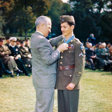 October 12, 1945 - President Truman presents Pfc. Desmond Doss with the Congressional Medal of Honor.