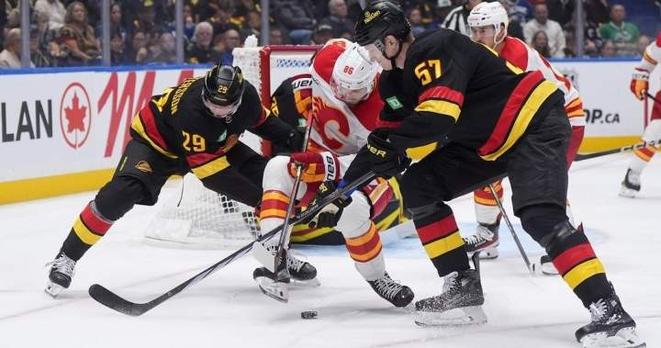 Canucks’ Myers fined for slashing Oilers’ McDavid