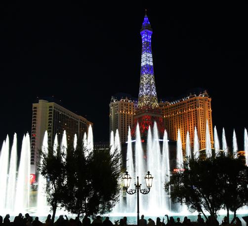 Bellagio fountains are all up in front of the Las Vegas strip Eiffel Tower
