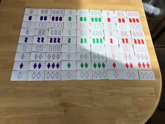 All cards in Set organized by color, shape, number, shading so you can find them all