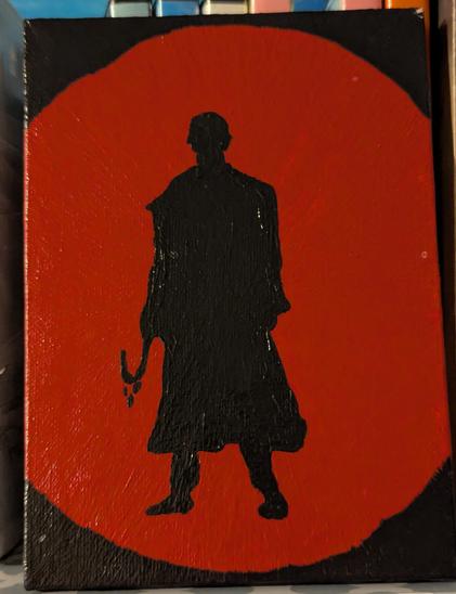 My 5X7 painting I did of the black silhouette of Candyman standing tall with a hook for a hand in a red circle on a black background.