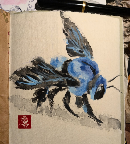 a blue carpenter bee with loose watercolor/ink-like strokes. the texture of the paper is very rough, which shoiws on the bee's wings, legs, and the stem it's standing on. there's a red seal stamp at the bottom left