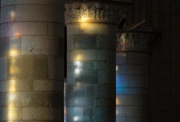Columns in a church with spots of light
