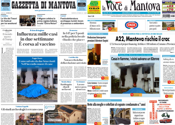 Prima pagina di giornali locali. Nell'immagine si vedono le prime pagine di due quotidiani: "Gazzetta di Mantova" a sinistra e "La Voce di Mantova" a destra. Entrambe le prime pagine riportano notizie locali, tra cui un titolo sull'influenza e la corsa al vaccino, e un’altra notizia riguardo a un incendio in cui una persona anziana è stata salvata dai vicini. Ci sono anche fotografie, soprattutto di un edificio danneggiato dall’incendio. I titoli e gli articoli sono disposti in colonne con piccolo testo, tipico delle prime pagine dei giornali.