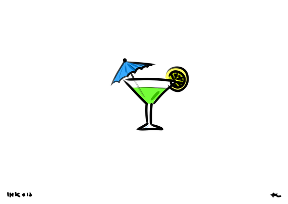 A triangular glass with a greenish cocktail, a lemon at the side and a little paper umbrella.